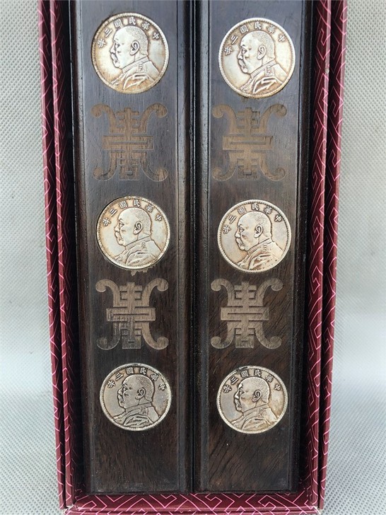 血檀木镶银元袁大头镇尺一对