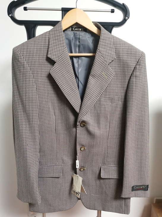 鄂尔多斯产纯羊毛西服，羊毛含量100%，全...