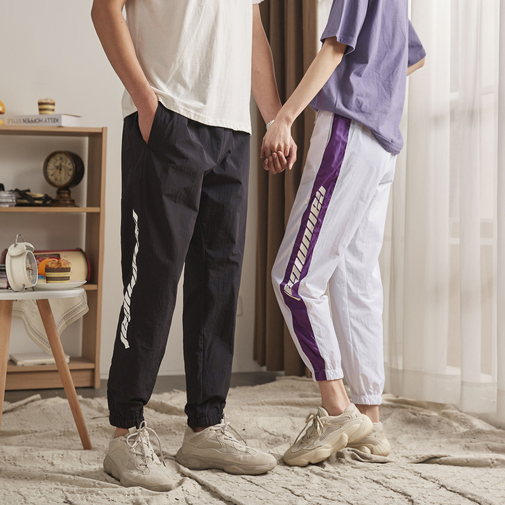 唐狮春季新品情侣休闲裤男女运动裤宽松