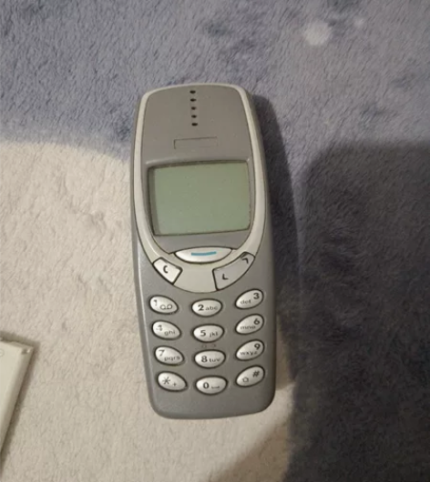 摩托罗拉33310手机一台，品相如图售出不...