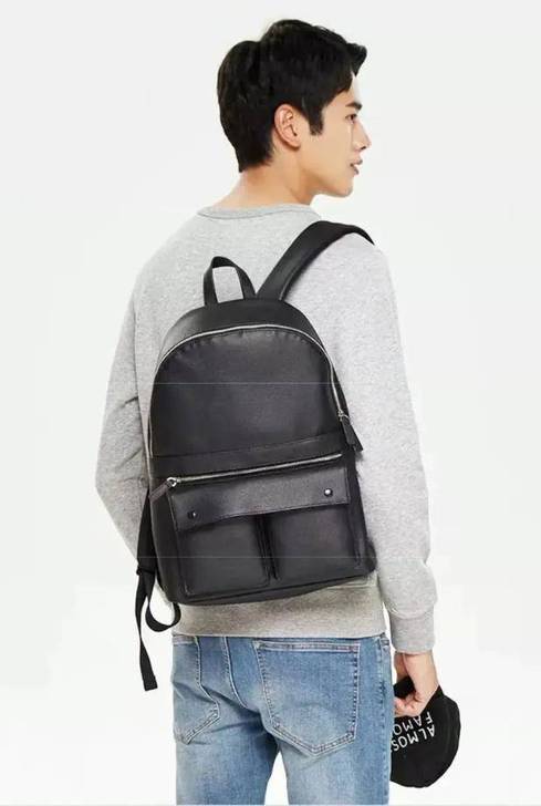 沐薄款男式双肩包