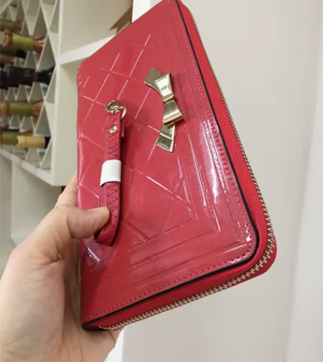 真皮手包女士长款手拿包钱包全新特价包邮 朋...