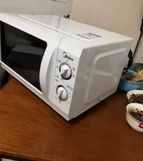 美的八九成新微波炉，玻璃转盘，全方位均匀加...