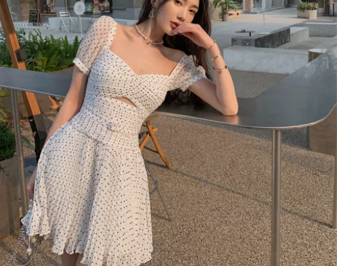 夏装新款女装性感露腰波点百褶白色短袖修身连...