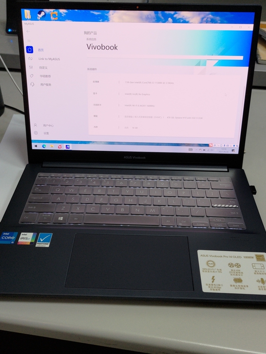华硕无畏pro14 i5版,OLED屏很惊...
