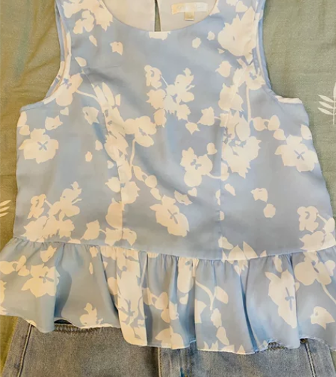 乐町短款无袖上衣，以前喜欢短裙、短裤， 现...