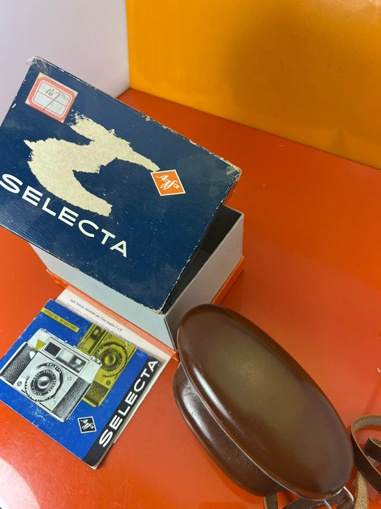 很新的爱克发皮套，带原包装纸盒，说明书。皮...