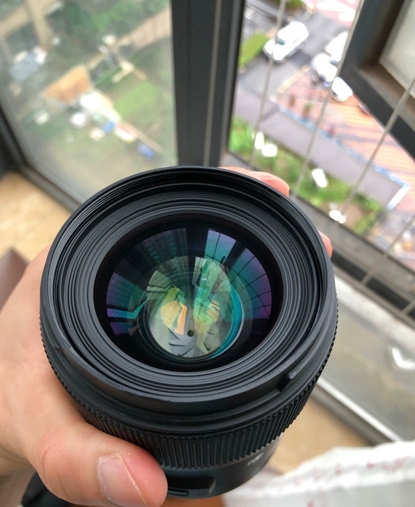 适马35 1.4art 索尼e口，前镜片有...