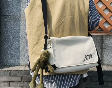 帆布斜挎包男士学生韩版潮流女式ins潮牌嘻...