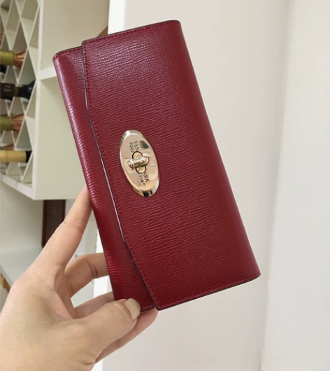 真皮钱包女士长款手拿包紫红色全新特价 姐姐...