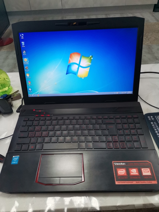 笔记本神州炫龙炎魔系列游戏本TN15S。带...