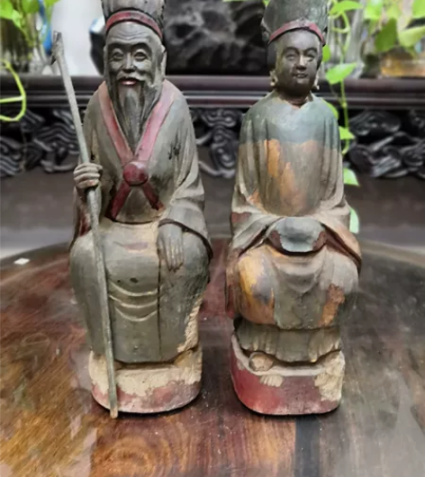清代，木雕彩绘土地公婆，高30厘米。 感兴...