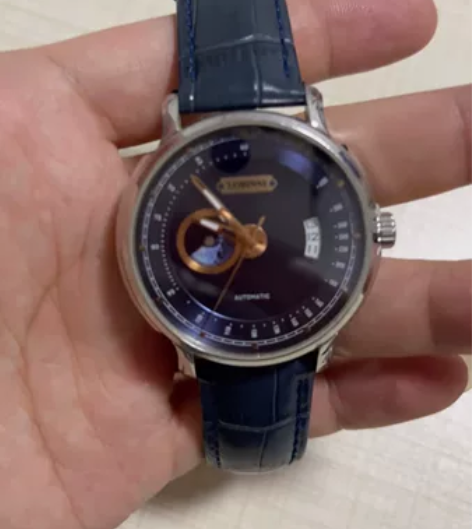 罗宾尼机械手表，一切功能正常，买来三年多了...