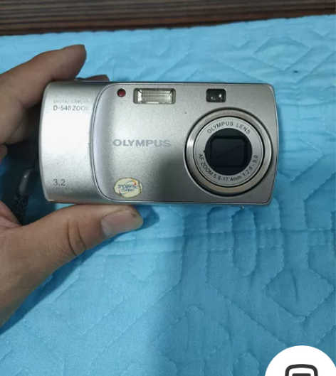 奥林巴斯相机正常使用,机器无任何暗病,无配...