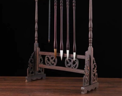 还有三十个复古龙头大号鸡翅木实木毛笔架毛笔...