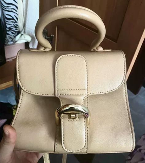 斜挎包女士包包卡其色 感兴趣的话点“我想要...