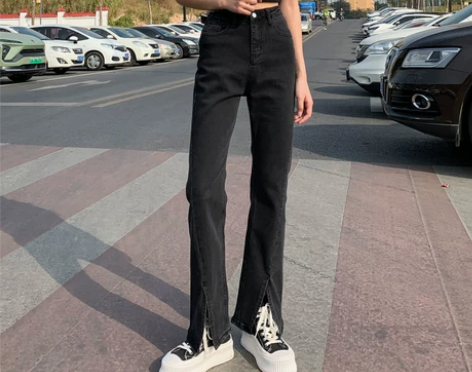 开叉黑色直筒微喇叭牛仔裤女2022年新款春...