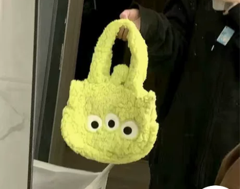 松松三眼仔包包女高级感洋气可爱秋冬毛绒手提...