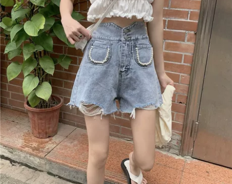 浅蓝色珍珠牛仔短裤高腰不规则破洞裤女ins...