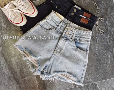 韩版洋气高腰双排扣破洞牛仔短裤女时尚收腹无...