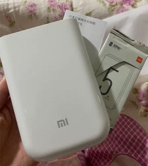 小米口袋打印相机 公司比赛奖品，用一次里面...