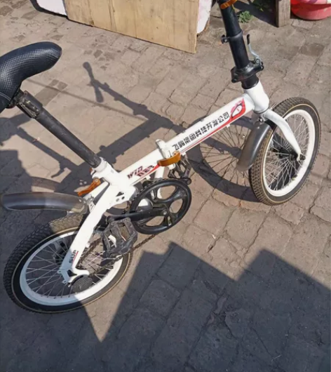 飞鸽折叠自行车，没有刹车，刹车让我爸拆了，...