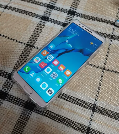 华为nova2s，6+64樱花粉色，听筒旁...