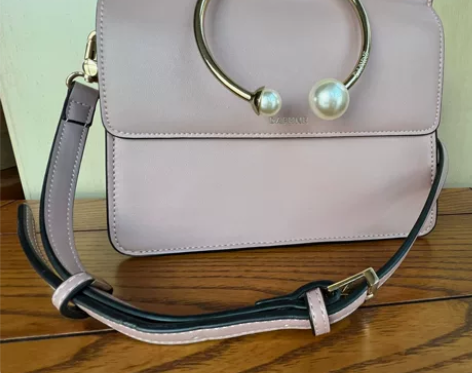 橡皮粉色包包 珍珠女士斜挎手拎包 成色如图...