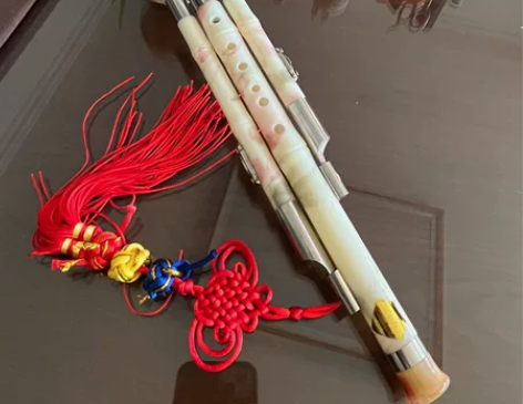 葫芦丝C调，仿桃花很漂亮。原价53，学校让...