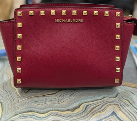 美国正品MK女包时尚笑脸包小号柳钉单肩斜挎...