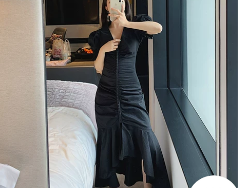 小潘潘 夏新款复古不规则荷叶边裙褶皱v领...