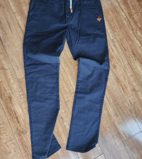 全新深海蓝色休闲裤，仿大牌款式。买来一直闲...