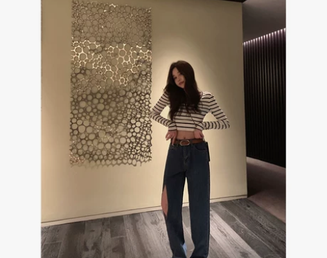 SASA高腰显瘦显腿长个性设计感破洞宽松休...