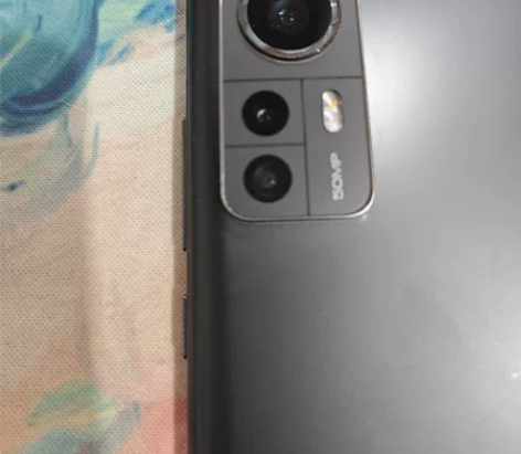 小米12x黑色8+128，橙色9成，边框磕...