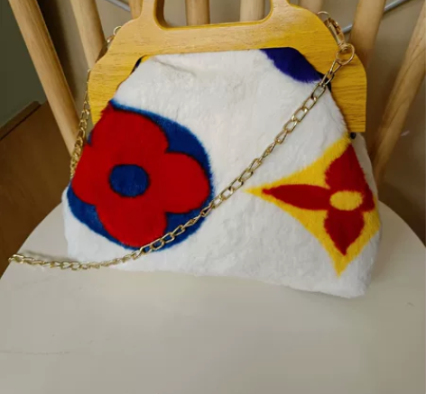 毛毛夹子包 手提斜挎包 软乎乎 全新包包 ...