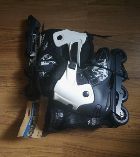 迪卡侬直排自由式轮滑鞋带全套护具(包括护膝...