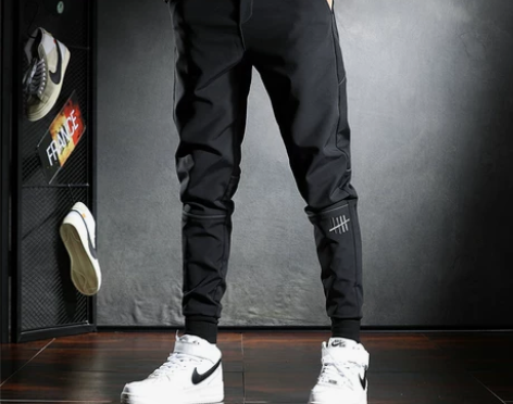 个性刺绣春夏季冰丝薄款修身小脚男士黑色休闲...