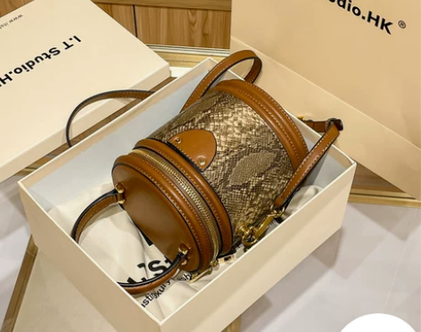 香港代购真皮女包高级感水桶包女圆柱形斜挎包...