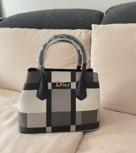 女士手提包（可斜挎）有长肩带 线下实体店购...