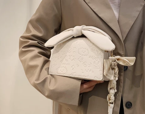 天彩翼飞 女士包 感兴趣的话点“我想要”和...