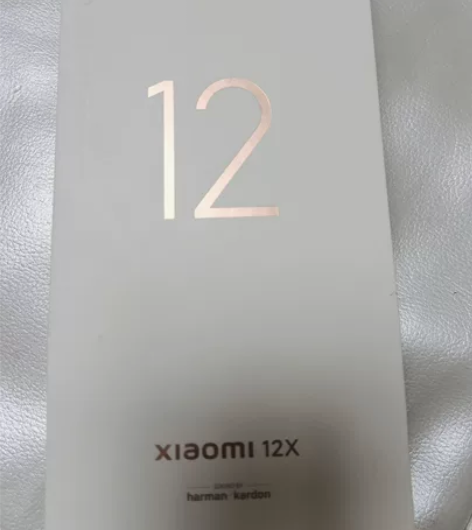 小米12x，8+128，紫色，有2处非常小的点左右两侧如图，...