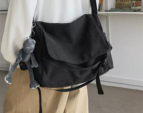 【狂欢价】帆布斜挎包男大容量简约邮差包休闲...