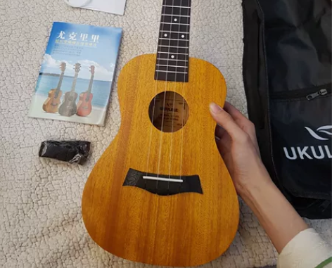 uma全新尤克里里单板23寸出原价600元...