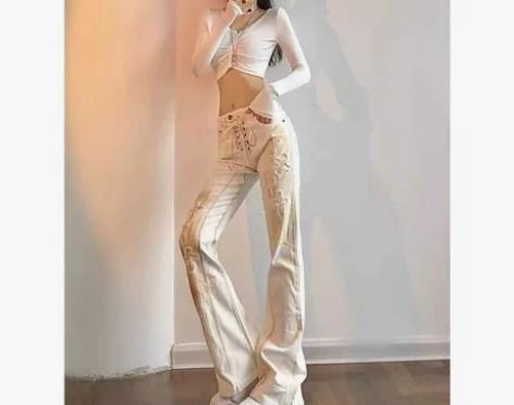 白色牛仔裤高腰修身喇叭美式欧美炸街十字架辣...