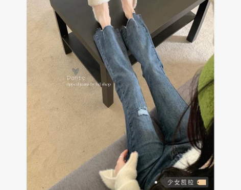 不规则破洞九分牛仔裤女夏季2022年新款高...