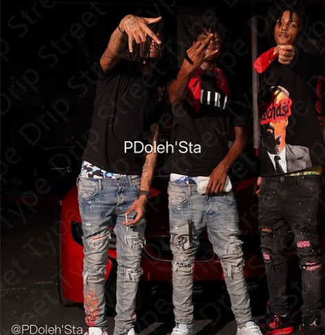 Amiri浅色破洞橙色火焰印花补丁破洞弹力...