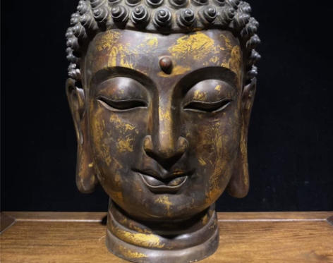 回流老铜鎏金《释迦牟尼·佛首》一尊，制作精...