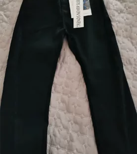 啄木鸟黑色微喇叭开叉牛仔裤女 冬季拖地高腰...