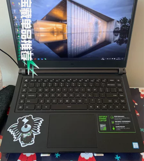 小米游戏本，999新。玩魔兽世界没问题。不...