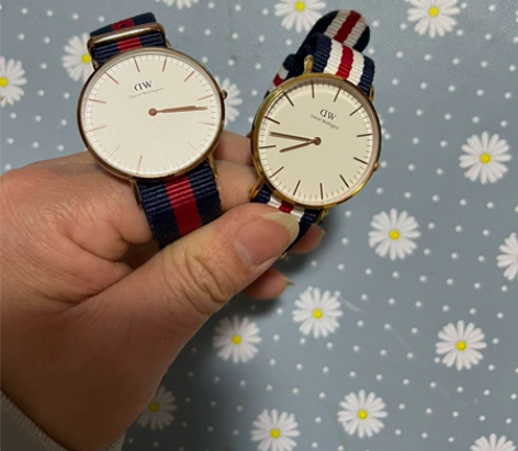 两块DW手表，一块玻璃有划痕150，一块没...